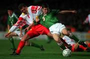 9 October 1996; Denis Irwin of Republic of Ireland in action against Zoran Jovanovski of Macedonia during the FIFA World Cup 1998 Group 8 Qualifier between Republic of Ireland and Macedonia at Lansdowne Road in Dublin. Photo by David Maher/Sportsfile