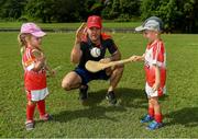 10 December 2017; GPA President David Collins with Isabelle Smith, 3 years, and Sean O'Brien during a coaching session and end of season medal presentations at the Singapore Gaelic Lions GAA training session at The Grandstand, Turf Club Rd, Bukit Timah, Singapore  Photo by Ray McManus/Sportsfile