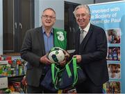 20 December 2017; FAI CEO John Delaney, along with Republic of Ireland Under 16 manager Paul Osam and Women's U16 manager Sharon Boyle, hand over Ireland bags full with jerseys, footballs & other merchandise to Liam Casey, East Region President, of the St Vincent De Paul as part of a Christmas donation for families in need. Pictured are Liam Casey, East Region President, of the St Vincent De Paul, left, and FAI CEO John Delaney, at the St Vincent De Paul National Office on Sean McDermott Street in Dublin. Photo by Seb Daly/Sportsfile