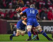 26 December 2017; Jean Kleyn of Munster is tackled by Jack Conan and Mick Kearney of Leinster during the Guinness PRO14 Round 11 match between Munster and Leinster at Thomond Park in Limerick. Photo by Brendan Moran/Sportsfile