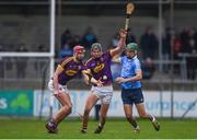 14 January 2018; Paudie Foley, left, and Jack O'Connor of Wexford in action against Danny Sutcliffe of Dublin during the Bord na Mona Walsh Cup semi-final match between Dublin and Wexford at Parnell Park in Dublin. Photo by Daire Brennan/Sportsfile