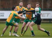 21 January 2018; Ian Nolan of Fulham Irish in action against Dylan Wall, left, Michael Lundy, centre, and Ronan Steede of Fulham Irish during the AIB GAA Football All-Ireland Senior Club Championship Quarter-Final Refixture match between Fulham Irish and Corofin at McGovern Park in Ruislip, England. Photo by Matt Impey/Sportsfile