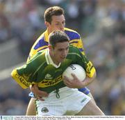 4 August 2003; Declan O'Sullivan of Kerry in action against John Whyte of Roscommon during the Bank of Ireland All-Ireland Senior Football Championship Quarter Final between Kerry and Roscommon at Croke Park in Dublin. Photo by Ray McManus/Sportsfile