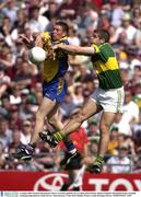 4 August 2003; Eamon Fitzmaurice of Kerry in action against Gerry Lohan of Roscommon during the Bank of Ireland All-Ireland Senior Football Championship Quarter Final between Kerry and Roscommon at Croke Park in Dublin. Photo by Brendan Moran/Sportsfile