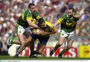4 August 2003; Karl Mannion of Roscommon in action against Darragh O'Se of Kerry, left, and Seamus Moynihan of Kerry during the Bank of Ireland All-Ireland Senior Football Championship Quarter Final between Kerry and Roscommon at Croke Park in Dublin. Photo by Brendan Moran/Sportsfile
