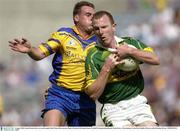 4 August 2003; Liam Hassett of Kerry in action against Paul Noone of Roscommon during the Bank of Ireland All-Ireland Senior Football Championship Quarter Final between Kerry and Roscommon at Croke Park in Dublin. Photo by Brendan Moran/Sportsfile