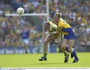 4 August 2003; Sean O'Sullivan of Kerry in action against Morgan Beirne of Roscommon during the Bank of Ireland All-Ireland Senior Football Championship Quarter Final between Kerry and Roscommon at Croke Park in Dublin. Photo by Ray McManus/Sportsfile
