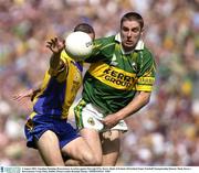 4 August 2003; Jonathan Dunning of Roscommon in action against Darragh O'Se of Kerry during the Bank of Ireland All-Ireland Senior Football Championship Quarter Final between Kerry and Roscommon at Croke Park in Dublin. Photo by Brendan Moran/Sportsfile