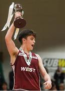 24 January 2018; Paul Kelly of St Pauls Oughterard lifts the cup after the Subway All-Ireland Schools U19B Boys Cup Final match between St Pauls Oughterard and St Vincents Castleknock College at the National Basketball Arena in Tallaght, Dublin. Photo by Eóin Noonan/Sportsfile