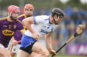 28 January 2018; Kevin Moran of Waterford in action against Paudie Foley of Wexford during the Allianz Hurling League Division 1A Round 1 match between Waterford and Wexford at Walsh Park in Waterford.  Photo by Matt Browne/Sportsfile