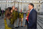 29 January 2018; An Taoiseach, Leo Varadkar congratulated Team Ireland Winter Olympic athletes ahead of their departure for the Pyeongchang Winter Olympics. The Olympic Council of Ireland (OCI) confirmed that five Irish athletes have qualified to represent Team Ireland at the 2018 Winter Olympic Games in PyeongChang, South Korea, from the 9th – 25th February. Team Ireland, who were gathered in Dublin today for a workshop, held jointly by the OCI and Sport Ireland were met by An Taoiseach Leo Varadkar who congratulated them on the achievement of being selected to represent Ireland at the Olympic Games and presented them with their official Team Ireland kit. Pictured is An Taoiseach Leo Varadkar with alpine skier Tess Arbez. Photo by Ramsey Cardy/Sportsfile