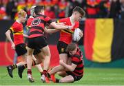 8 February 2018; Robbie Browne of CBC Monkstown is tackled by Harry Rogers, left, and Fiach O'Byrne of Kilkenny College during the Bank of Ireland Leinster Schools Junior Cup Round 1 match between CBC Monkstown and  Kilkenny College at Donnybrook Stadium in Dublin. Photo by Eóin Noonan/Sportsfile