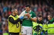 10 February 2018; Robbie Henshaw of Ireland grimaces with a shoulder injury as he leaves the pitch with Ireland team doctor Ciaran Cosgrave during the Six Nations Rugby Championship match between Ireland and Italy at the Aviva Stadium in Dublin. Photo by Brendan Moran/Sportsfile
