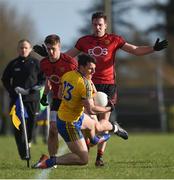11 February 2018; Diarmuid Murtagh of Roscommon in action against Colm Flanagan, left, and Niall Donnelly of Down during the Allianz Football League Division 2 Round 3 match between Roscommon and Down at Dr. Hyde Park in Roscommon. Photo by Daire Brennan/Sportsfile