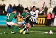 11 February 2018; Robbie Benson of Dundalk in action against Conor McCormack, left, and Barry McNamee of Cork City during the President's Cup match between Dundalk and Cork City at Oriel Park in Dundalk, Co Louth. Photo by Seb Daly/Sportsfile