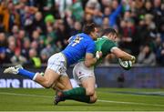 10 February 2018; Robbie Henshaw of Ireland is tackled by Tommaso Benvenuti of Italy on the way to scoring his side's fifth try during the Six Nations Rugby Championship match between Ireland and Italy at the Aviva Stadium in Dublin. Photo by Brendan Moran/Sportsfile