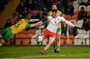 17 February 2018; Michael Cassidy of Tyrone in action against Conor Morrison of Donegal during the Bank of Ireland Dr. McKenna Cup Final match between Tyrone and Donegal at the Athletic Grounds in Armagh. Photo by Oliver McVeigh/Sportsfile