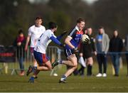 17 February 2018; Mark Rossiter of Waterford Institute of Technology in action against Cormac Coffey of Mary Immaculate College Limerick during the Electric Ireland HE GAA Trench Cup Final match between Waterford Institute of Technology and Mary Immaculate College Limerick at Santry Avenue in Dublin. Photo by Daire Brennan/Sportsfile