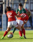 25 February 2018; Kim Flood of Ireland is tackled by Rebecca De Filippo, right, and Kerin Lake of Wales during the Women's Six Nations Rugby Championship match between Ireland and Wales at Donnybrook Stadium in Dublin. Photo by David Fitzgerald/Sportsfile