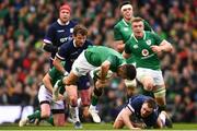 10 March 2018; Conor Murray of Ireland beats the tackle by Stuart Hogg of Scotland during the NatWest Six Nations Rugby Championship match between Ireland and Scotland at the Aviva Stadium in Dublin. Photo by Ramsey Cardy/Sportsfile