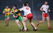 10 March 2018; Mark McHugh of Donegal in action against Colm Cavanagh and Pádraig Hampsey of Tyrone match between Tyrone and Donegal at Healy Park in Omagh, Co Tyrone. Photo by Oliver McVeigh/Sportsfile