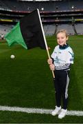 17 March 2018: AIB flagbearer Ebany Crotty, age 9, who won an AIB flag bearer competition to wave on Nemo Rangers sat the AIB Senior Football Club Championship Final between Corofin and Nemo Rangers at Croke Park on St. Patrick's Day. For exclusive content and behind the scenes action of the AIB GAA & Camogie Club Championships follow AIB GAA on Facebook, Twitter, Instagram and Snapchat and www.aib.ie/gaa. Photo by Stephen McCarthy/Sportsfile