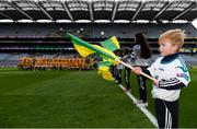 17 March 2018: AIB flagbearer Evan O'Sullivan, age 8, who won an AIB flag bearer competition to wave on Corofin sat the AIB Senior Football Club Championship Final between Corofin and Nemo Rangers at Croke Park on St. Patrick's Day. For exclusive content and behind the scenes action of the AIB GAA & Camogie Club Championships follow AIB GAA on Facebook, Twitter, Instagram and Snapchat and www.aib.ie/gaa. Photo by Stephen McCarthy/Sportsfile