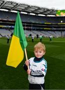 17 March 2018: AIB flagbearer Evan O'Sullivan, age 8, who won an AIB flag bearer competition to wave on Corofin sat the AIB Senior Football Club Championship Final between Corofin and Nemo Rangers at Croke Park on St. Patrick's Day. For exclusive content and behind the scenes action of the AIB GAA & Camogie Club Championships follow AIB GAA on Facebook, Twitter, Instagram and Snapchat and www.aib.ie/gaa. Photo by Stephen McCarthy/Sportsfile