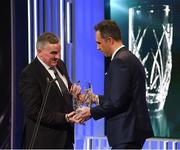 18 March 2018; Karl Donnelly, Head of Sponsorship at 3 Ireland, presents Mark Magee, son of the late broadcaster Jimmy Magee, with the Special Merit award during the 3 FAI International Awards at RTE Studios in Donnybrook, Dublin. Photo by Stephen McCarthy/Sportsfile