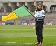 17 March 2018: AIB flagbearer Amy Jordan, age 10, who won an AIB flag bearer competition to wave on Nemo Rangers at the AIB Senior Football Club Championship Final between Corofin and Nemo Rangers at Croke Park on St. Patrick's Day. For exclusive content and behind the scenes action of the AIB GAA & Camogie Club Championships follow AIB GAA on Facebook, Twitter, Instagram and Snapchat and www.aib.ie/gaa. Photo by David Fitzgerald/Sportsfile