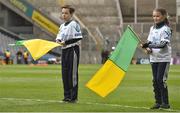 17 March 2018: AIB flagbearer Tommy Dempsey, age 12, left, and Leanne Kate Costello, age 10, who won an AIB flag bearer competition to wave on Nemo Rangers at the AIB Senior Football Club Championship Final between Corofin and Nemo Rangers at Croke Park on St. Patrick's Day. For exclusive content and behind the scenes action of the AIB GAA & Camogie Club Championships follow AIB GAA on Facebook, Twitter, Instagram and Snapchat and www.aib.ie/gaa. Photo by David Fitzgerald/Sportsfile