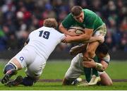 17 March 2018; Jordan Larmour of Ireland is tackled by Ben Te'o, left, and Joe Launchbury of England during the NatWest Six Nations Rugby Championship match between England and Ireland at Twickenham Stadium in London, England. Photo by Ramsey Cardy/Sportsfile