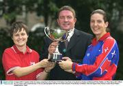 8 August 2003; Lifford FC captain Mary Ryan, left, and captain Carmel Kissane of UCD, are photographed with the FAI Chief Executive Fran Rooney at Merrion Square Park, Dublin, ahead of the Women's FAI Senior Cup Final match, in Richmond Park, Dublin, next Sunday. Photo by David Maher/Sportsfile