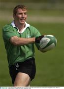 6 August 2003; Jonathan Bell makes a pass during an Irish rugby squad training session at Dubarry Park, Athlone, Co. Westmeath. Photo by Brendan Moran/Sportsfile