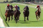 10 August 2003; High Chaparral, with Mick Kinane up, races clear of Imperial Dancer, with Richard Hughes up, right, and In Time's Eye with Pat Smullen up, left, on their way to winning the Royal Whip Stakes at The Curragh Racecourse in Kildare.