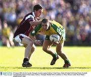 10 August 2003; Kevin Cassidy of Donegal, in action against Paul Clancy of Galway, during the Bank of Ireland All-Ireland Senior Football Championship Quarter-Final replay match between Galway and Donegal at McHale Park in Castlebar, Co Mayo. Photo by David Maher/Sportsfile