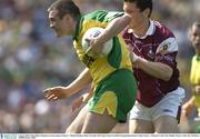 4 August 2003; John Gildea of Donegal, in action against Michael Meehan of Galway, during the Bank of Ireland All-Ireland Senior Football Championship Quarter Final match between Galway and Donegal at Croke Park in Dublin. Photo by Ray McManus/Sportsfile