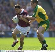 4 August 2003; Declan Meehan of Galway, in action against  Kevin Walsh of Donegal during the Bank of Ireland All-Ireland Senior Football Championship Quarter Final match between Galway and Donegal at Croke Park in Dublin. Photo by Ray McManus/Sportsfile