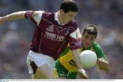 4 August 2003; Michale Meehan of Galway, in action against  Mark Crossan of Donegal during the Bank of Ireland All-Ireland Senior Football Championship Quarter Final match between Galway and Donegal at Croke Park in Dublin. Photo by Ray McManus/Sportsfile