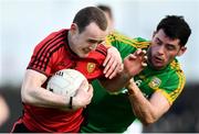 25 March 2018; Shane Miller of Down is tackled by Donal Keogan of Meath during the Allianz Football League Division 2 Round 7 match between Meath and Down at Páirc Tailteann in Navan, Co Meath. Photo by Ramsey Cardy/Sportsfile