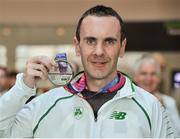 25 March 2018; Niall Sheil from St. Killians AC, Co. Wexford with his silver medal he won in the Mens 5k cross country team event, during European Masters Indoor Track & Field Championships in Madrid, at Dublin Airport in Dublin. Photo by Tomás Greally/Sportsfile