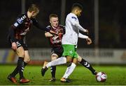 26 March 2018; Kaleem Simon of Cabinteely in action against Jamie Hamilton, centre, and JJ Lunney of Bohemians during the EA SPORTS Cup First Round match between Bohemians and Cabinteely at Dalymount Park in Dublin. Photo by David Fitzgerald/Sportsfile