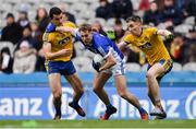 1 April 2018; Pádraig Faulkner of Cavan in action against Ciarán Lennon, left, and Cathal Compton of Roscommon during the Allianz Football League Division 2 Final match between Cavan and Roscommon at Croke Park in Dublin. Photo by Piaras Ó Mídheach/Sportsfile