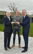 4 April 2018; Dundalk goalkeeper Gary Rogers is presented with an award to mark his 500th SSE Airtricity League appearance by FAI President Tony Fitzgerald, left, and FAI Chief Executive John Delaney at the FAI HQ in Abbotstown, Dublin. Photo by Seb Daly/Sportsfile