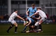 5 April 2018; Jamie Glynn of UCD is tackled by Trinity players, from left, Angus Lloyd, Kyle Dixon and Sam Pim during the Annual Rugby Colours Match 2018 match between UCD and Trinity at College Park in Trinity College, Dublin. Photo by Stephen McCarthy/Sportsfile