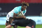 6 April 2018; Niyi Adeolokun of Connacht is tackled by Scott Otten of Ospreys during the Guinness PRO14 Round 19 match between Ospreys and Connacht at the Liberty Stadium in Swansea, Wales. Photo by Ben Evans/Sportsfile