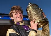 25 April 2018; Jockey David Mullins celebrates with the trophy after winning the Coral Punchestown Gold Cup on Bellshill at Punchestown Racecourse in Naas, Co. Kildare. Photo by Seb Daly/Sportsfile