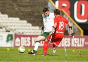 5 April 2018; David Saunders of Ireland, left, in action against Krystian Kaplan of Poland during the Citywest Hotel EAFF Amputee Football Weeks Tournament match between Ireland and Poland at Dalymount Park in Dublin. Photo by Barry Cregg/Sportsfile