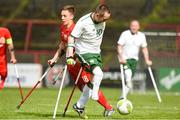 5 April 2018; Kevin O'Rourke, centre, of Ireland in action against Krystian Kaplon, of Poland during the Citywest Hotel EAFF Amputee Football Weeks Tournament match between Ireland and Poland at Dalymount Park in Dublin. Photo by Barry Cregg/Sportsfile
