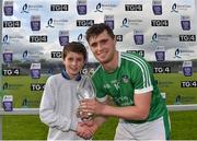 7 May 2018; Man of the match, Brian Ryan of Limerick is presented with his award by David Murphy, age 9, from Clareview, Limerick, after the Bord Gáis Energy Munster GAA Hurling U21 Championship quarter-final between Clare and Limerick at Cusack Park in Ennis, Clare. Photo by Eóin Noonan/Sportsfile